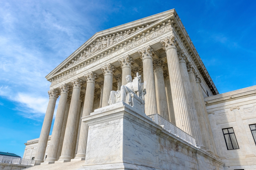 Front of the Supreme Court building with blue sky